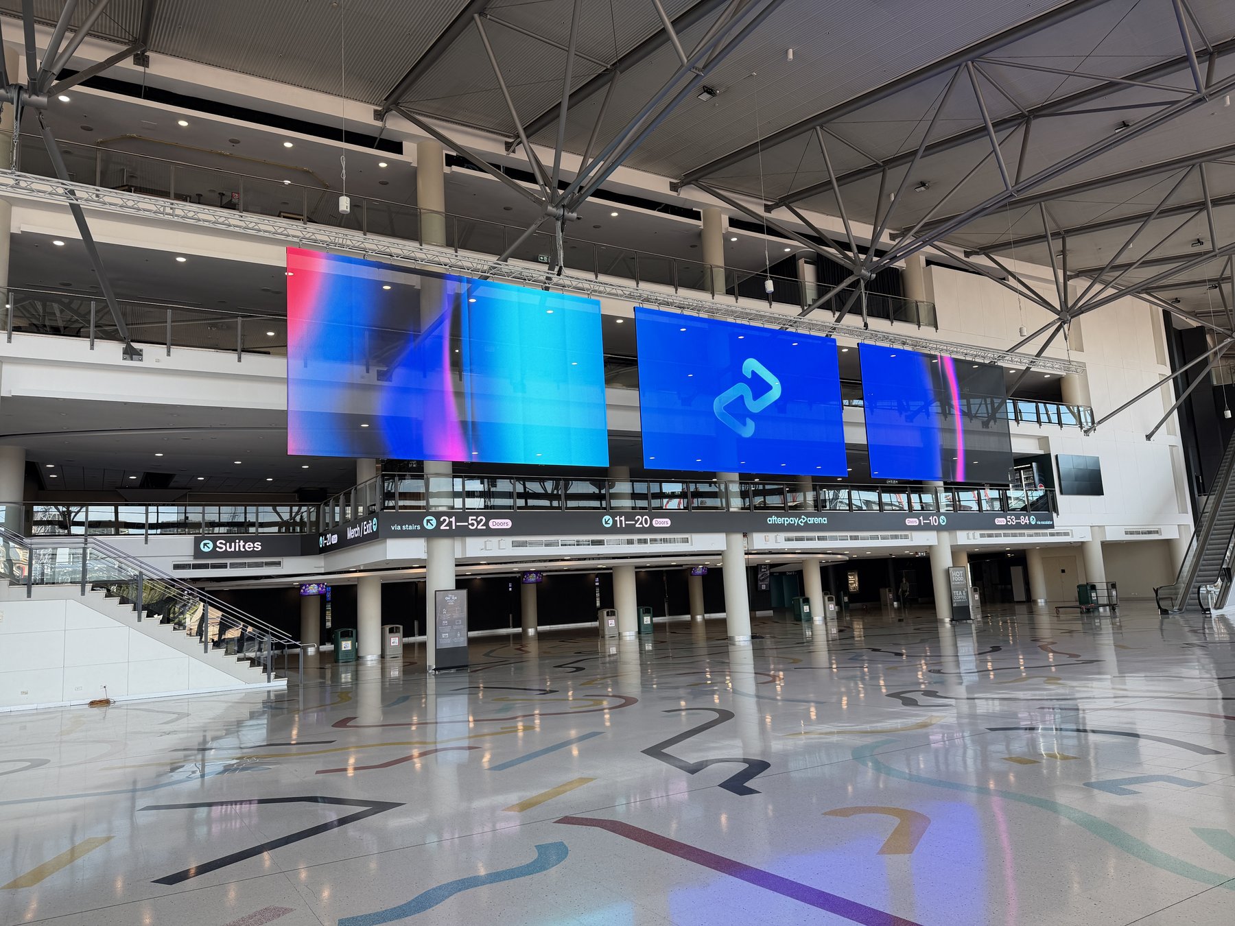 Transparent LED screens at Afterpay Arena with Afterpay branding
