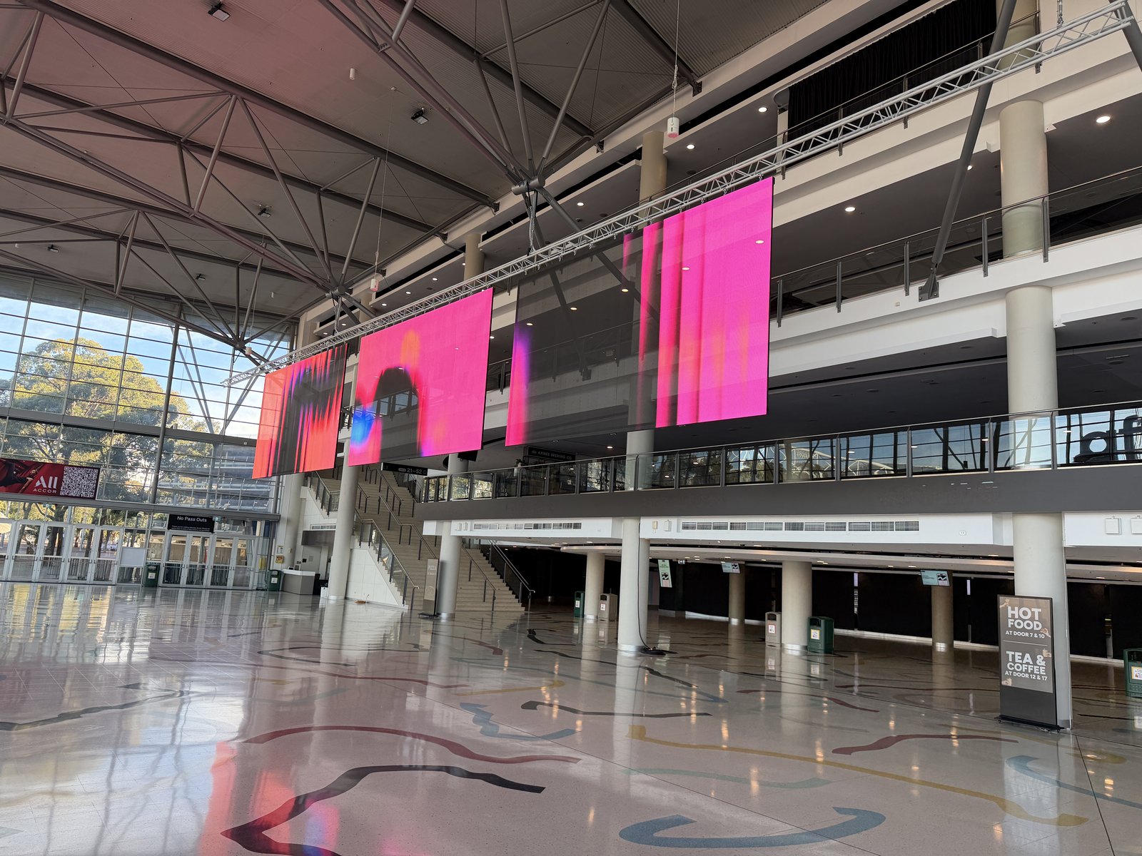 Transparent LED screens at Afterpay Arena, daylight view